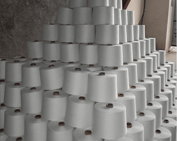 Yarn cones stacked and ready for dispatch at H&D Group